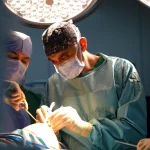 Dr. Usama Saleh in surgery room